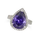 NO RESERVE - A PURPLE PASTE STONE AND DIAMOND RING in 18ct white gold, set with a pear cut purple...