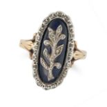 AN ANTIQUE BLUE GLASS AND DIAMOND RING in yellow gold and silver, comprising an oval blue glass w...