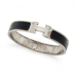 NO RESERVE - HERMES, A CLIC H BANGLE in palladium-plated hardware, decorated with black enamel, s...