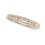 A SEVEN STONE DIAMOND RING in white gold, set with a row of seven round cut diamonds, no assay ma...
