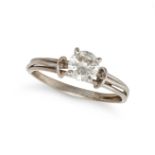 A SOLITAIRE DIAMOND RING in white gold, set with a round brilliant cut diamond of approximately 0...