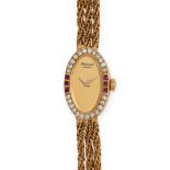 CHOPARD - A VINTAGE LADIES DIAMOND AND RUBY CHOPARD COCKTAIL WATCH in yellow gold, G 3890, sevent...