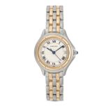 CARTIER - A BIMETAL CARTIER PANTHERE COUGAR WRISTWATCH in yellow gold and steel, 119 000 R, quart...