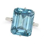 A BLUE ZIRCON DRESS RING, EARLY 20TH CENTURY set with an octagonal step cut blue zircon of approx...