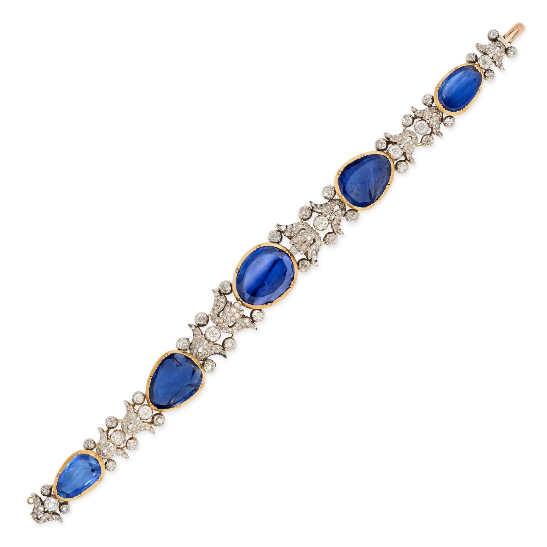 AN ANTIQUE CEYLON NO HEAT SAPPHIRE AND DIAMOND BRACELET in yellow gold and silver, set with five ...
