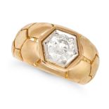A DIAMOND DRESS RING in 18ct yellow gold and platinum, set with a transitional cut diamond of app...