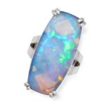 A FRENCH OPAL RING in 18ct white gold, set with a cabochon opal of 3.0cm, on a bifurcated band, F...