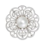 A PEARL AND DIAMOND FLOWER BROOCH in 18ct white gold, set to the centre with a pearl of 16.0mm to...