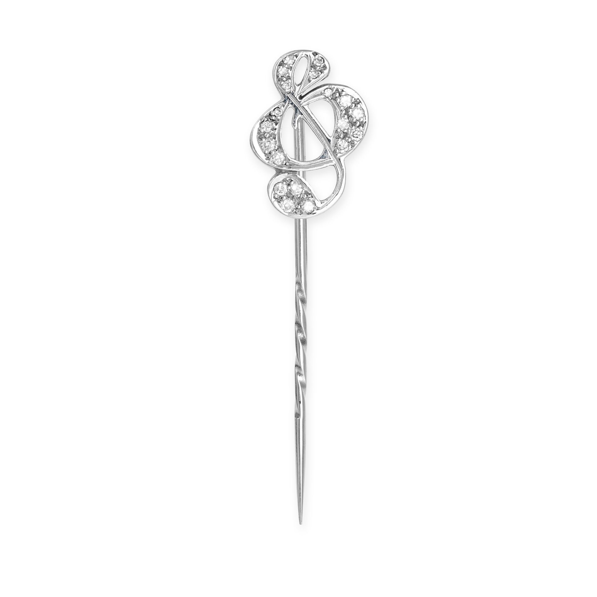 THEO FENNEL, A VINTAGE DIAMOND STICK PIN in 18ct white gold, designed as a treble clef set with r...