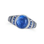 A CEYLON NO HEAT SAPPHIRE AND DIAMOND DRESS RING in platinum, set with a cushion cut sapphire of ...