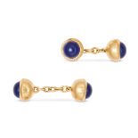 CARTIER, A PAIR OF LAPIS LAZULI CUFFLINKS, 1990 in 18ct yellow gold, set with cabochon lapis lazu...