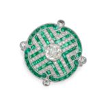 AN EMERALD AND DIAMOND DRESS RING in platinum, set with an old cut diamond of approximately 0.55 ...