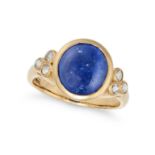 A SAPPHIRE AND DIAMOND RING in 18ct yellow gold, set with a round cabochon sapphire of approximat...