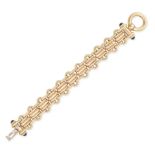 A SAPPHIRE FANCY LINK BRACELET in yellow gold, comprising a row of fancy links, accented by round...