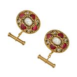 A PAIR OF INDIAN ENAMEL, RUBY AND DIAMOND CUFFLINKS in 22ct yellow gold, set with rose cut diamon...