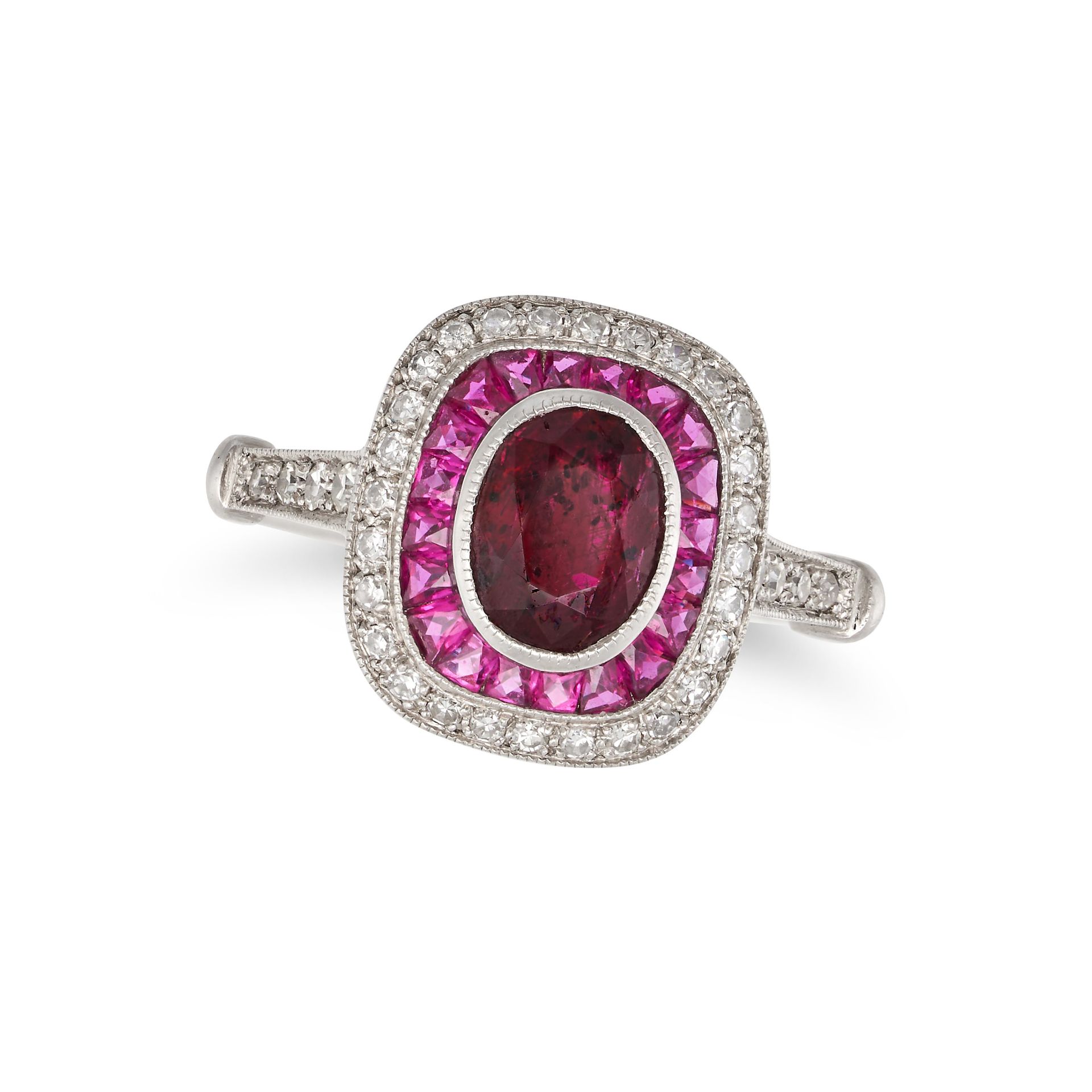 A RUBY AND DIAMOND DRESS RING in platinum, set with an oval cut ruby of 1.16 carats in a border o...