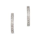 A PAIR OF DIAMOND HOOP EARRINGS in white gold, each designed as a hoop, half set with a row of ro...