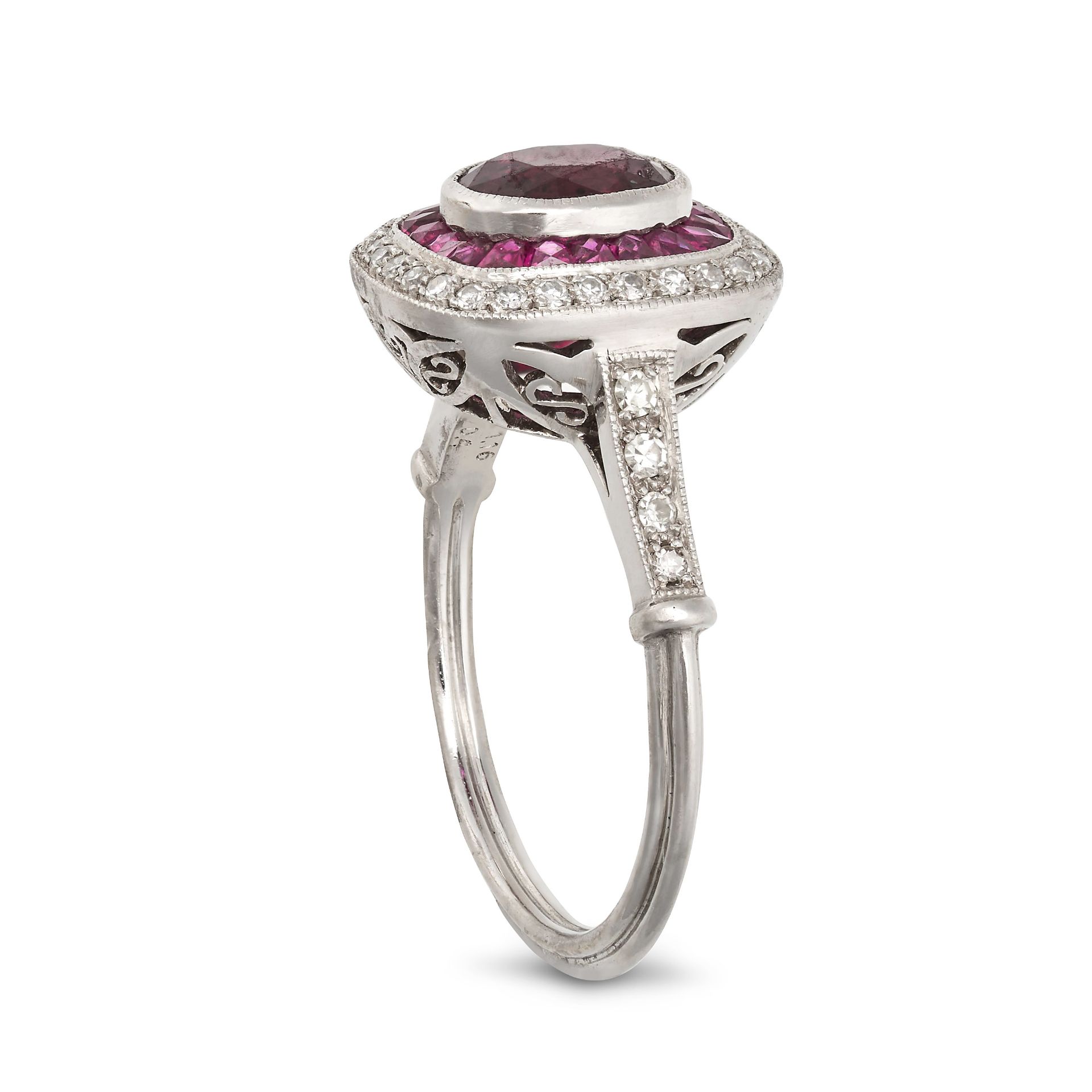 A RUBY AND DIAMOND DRESS RING in platinum, set with an oval cut ruby of 1.16 carats in a border o... - Image 2 of 2