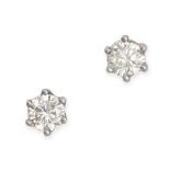 A PAIR OF DIAMOND STUD EARRINGS in platinum, each earring set with a round brilliant cut diamond,...