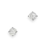 A PAIR OF DIAMOND STUD EARRINGS in white gold, each set with an old cut diamond of approximately ...