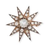 AN ANTIQUE DIAMOND STAR BROOCH in yellow gold and silver, designed as a ten rayed star set with a...
