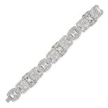 AN ART DECO DIAMOND BRACELET in platinum, comprising six geometric plaques set throughout with ol...