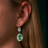 A PAIR OF GREEN BERYL DROP EARRINGS in 18ct yellow gold, each set with an oval cut green beryl su...
