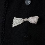 A FINE DIAMOND BOW BROOCH, 1930S in 18ct white gold, set throughout with single cut diamonds tota...