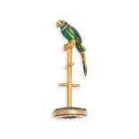 AN ANTIQUE RUBY, EMERALD, ENAMEL AND CARNELIAN PARROT DESK SEAL in yellow gold, set with a carnel...
