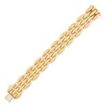 CARTIER, A GOLD GENTIANE BRACELET in 18ct yellow gold, comprising five rows of lozenge shaped lin...