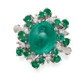 AN EMERALD AND DIAMOND CLUSTER RING in 14ct white gold, set with a cabochon emerald of 4.16 carat...