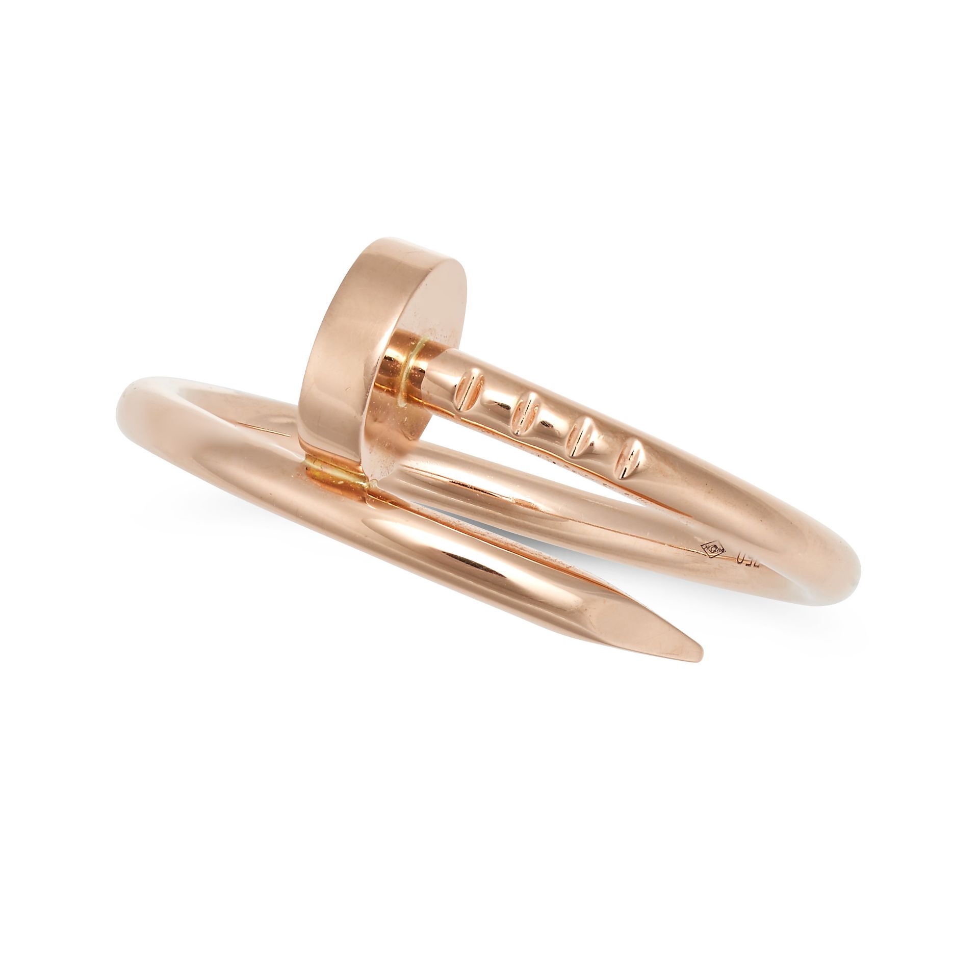 CARTIER, A JUSTE UN CLOU RING in 18ct rose gold, designed as a twisted nail, signed Cartier and n...