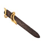 CHAUMET, A GOLD LETTER OPENER in 18ct yellow gold, the textured letter opener with an abstract ha...