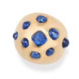 A FRENCH SAPPHIRE BOMBE RING in 18ct yellow gold, set with cabochon sapphires, French maker's mar...
