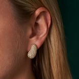 A PAIR OF DIAMOND EARRINGS in 18ct yellow gold, each designed as a beans and pave set with round ...