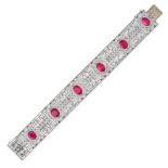 AN ART DECO FRENCH BURMA NO HEAT RUBY AND DIAMOND BRACELET in 18ct yellow gold and platinum, comp...