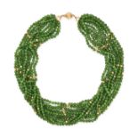 NO RESERVE - A NEPHRITE BEAD NECKLACE in 14ct yellow gold, comprising ten rows of polished nephri...