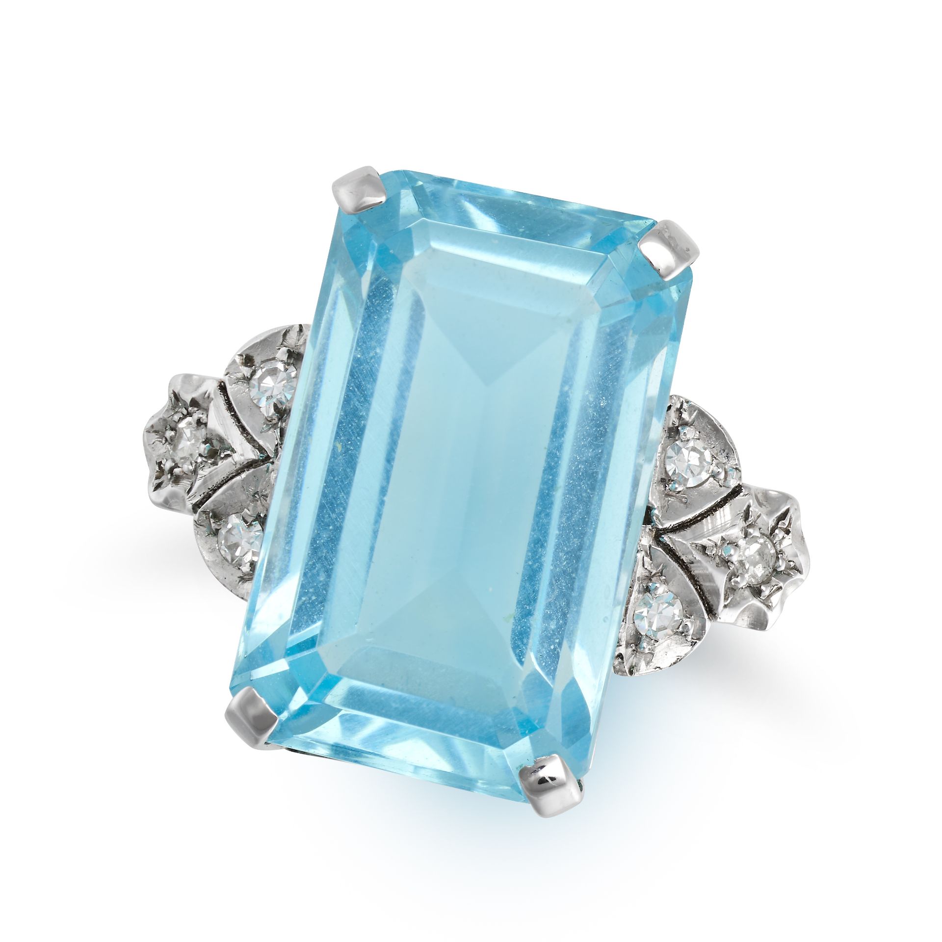 NO RESERVE - A BLUE GLASS AND DIAMOND RING in white gold, set with an octagonal step cut glue gla...