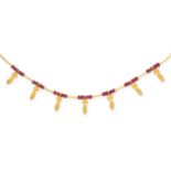 NO RESERVE - A RUBY BEAD COLLAR NECKLACE in 24ct yellow gold, comprising groups of faceted ruby b...