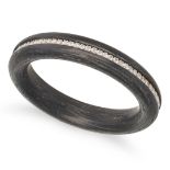 NO RESERVE - A CARBON AND DIAMOND RING comprising a band of carbon accented by a row of round bri...
