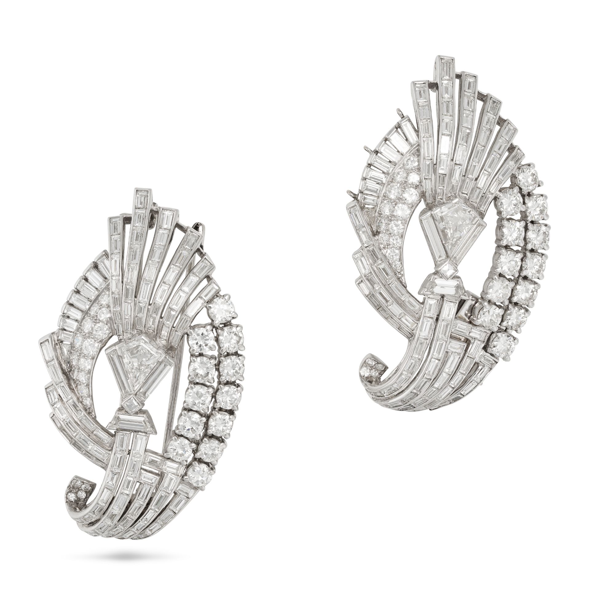 NO RESERVE - A DIAMOND BROOCH AND CLASP in platinum, each in a stylised scrolling design, set wit...