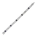 A SAPPHIRE AND DIAMOND BRACELET in 18ct white gold, comprising a row of geometric links set with ...