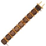 AN ANTIQUE SMOKEY QUARTZ BRACELET in yellow gold, comprising a row of nine cushion cut smokey qua...