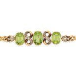 AN ANTIQUE PERIDOT AND DIAMOND BRACELET in yellow gold, the fancy link bracelet set with two octa...