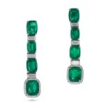 A PAIR OF EMERALD AND DIAMOND DROP EARRINGS in platinum, each set with three cushion cut emeralds...