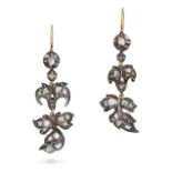 A PAIR OF DIAMOND DROP EARRINGS in yellow gold and silver, the earrings in foliate design, set wi...