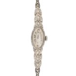 A LADIES DIAMOND ART DECO COCKTAIL WATCH in platinum and white gold, the oval dial with exaggerat...