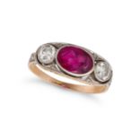 A RUBY AND DIAMOND RING in yellow gold and platinum, set with an oval cut ruby of approximately 1...