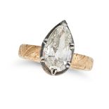 A DIAMOND RING in yellow gold and silver, set with a pear shaped old cut diamond of approximately...