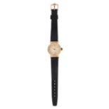 TIFFANY & CO. - A VINTAGE TIFFANY & CO. WRISTWATCH in 14ct yellow gold, the circular dial with gi...